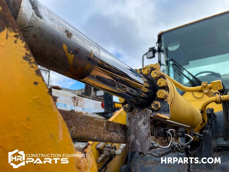 A hydraulic bucket cylinder.