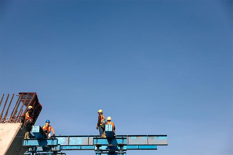 workers on scaffolding