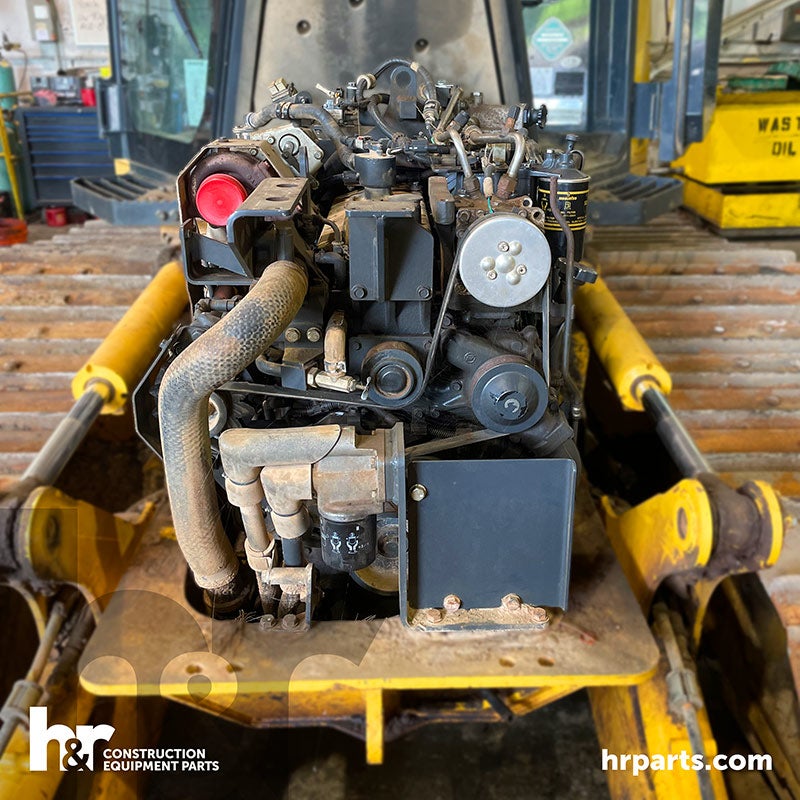 A Komatsu D39PX-23 being salvaged.