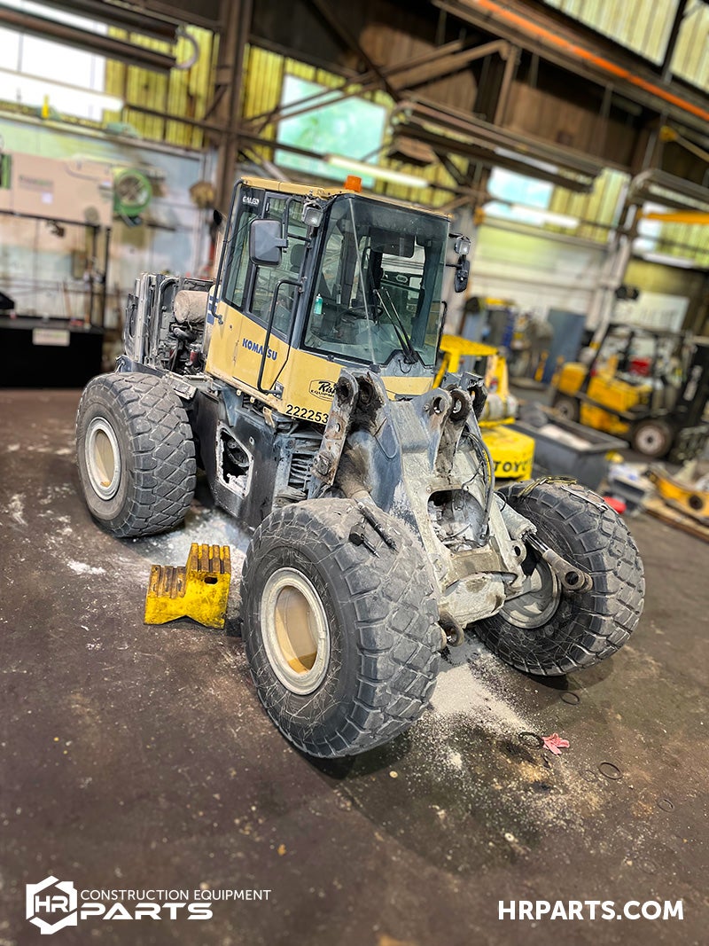 A wheel loader being salvaged.