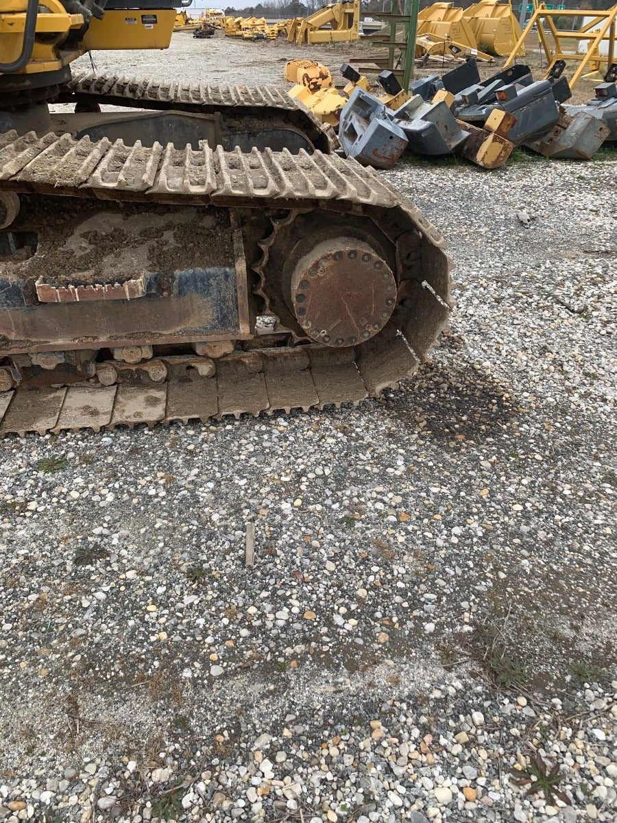 John Deere 350G LC leaves the heavy equipment salvage yard 4